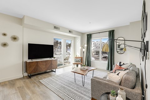 a living room with a couch and a tv